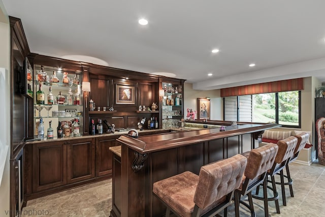 285 N Bay Ct, Lake Barrington, IL 60010 - indoor wet bar with recessed lighting and light stone finish floors