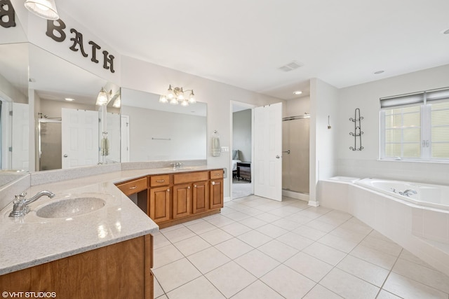 1755 Goldsboro Ln, Crystal Lake, IL 60014 - full bathroom featuring a shower stall, tile patterned floors, vanity, a garden tub, and a chandelier