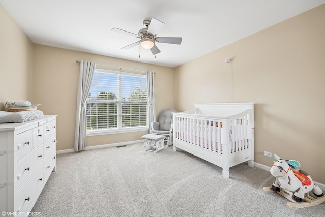 1755 Goldsboro Ln, Crystal Lake, IL 60014 - bedroom featuring a nursery area, carpet flooring, and ceiling fan