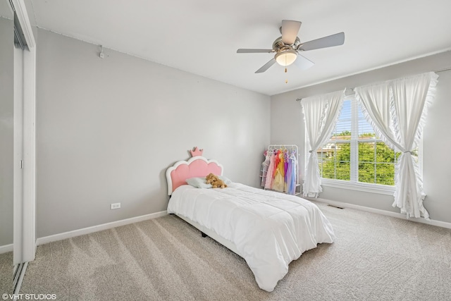 1755 Goldsboro Ln, Crystal Lake, IL 60014 - carpeted bedroom with baseboards and ceiling fan