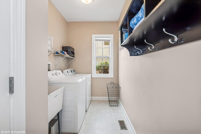 1755 Goldsboro Ln, Crystal Lake, IL 60014 - washroom with washing machine and dryer and baseboards