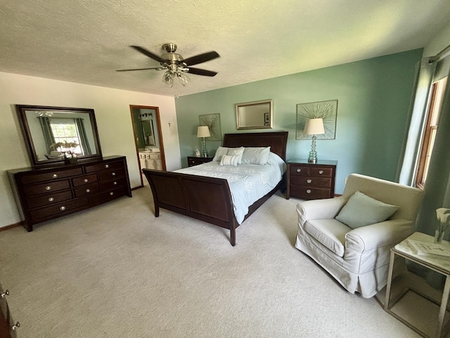 120 Colebrook Pl, Rockton, IL 61072 - bedroom featuring light carpet, connected bathroom, ceiling fan, and a textured ceiling
