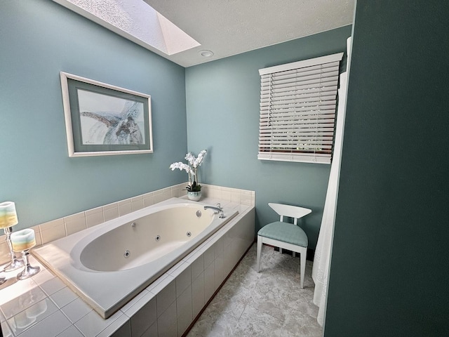 120 Colebrook Pl, Rockton, IL 61072 - full bathroom featuring a skylight, a whirlpool tub, and a textured ceiling