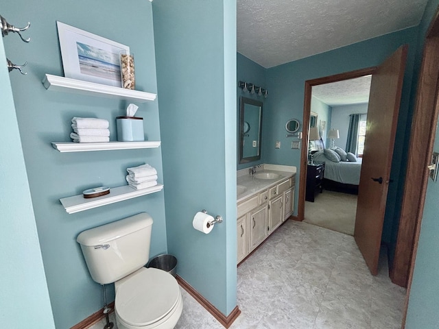 120 Colebrook Pl, Rockton, IL 61072 - bathroom with ensuite bath, vanity, and a textured ceiling