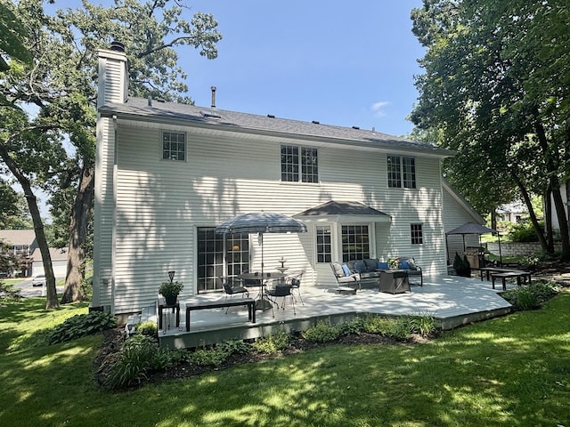 120 Colebrook Pl, Rockton, IL 61072 - rear view of house featuring outdoor lounge area, a chimney, a lawn, and a wooden deck