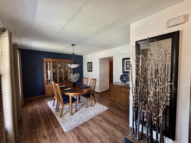 120 Colebrook Pl, Rockton, IL 61072 - dining area featuring a textured ceiling and wood finished floors