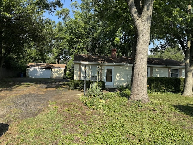 6006 Pershing Ave, Downers Grove, IL 60516 - ranch-style home featuring a chimney and a garage