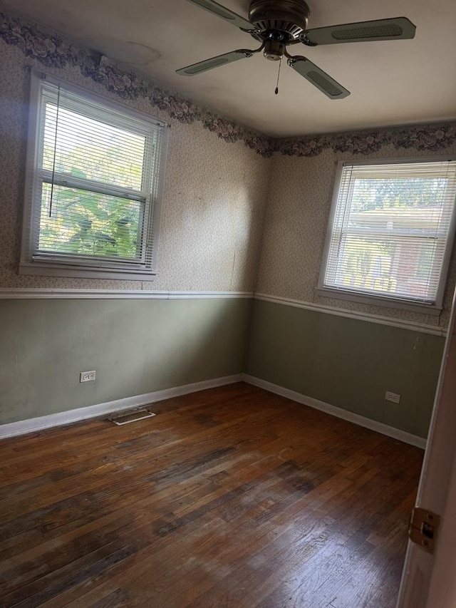 6006 Pershing Ave, Downers Grove, IL 60516 - spare room with wood finished floors, ceiling fan, and wallpapered walls