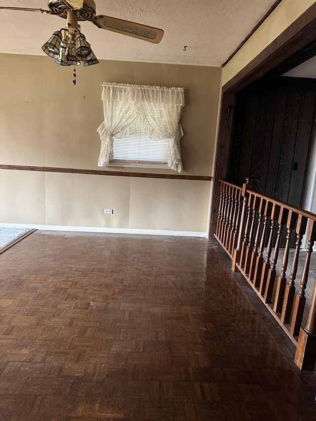 6006 Pershing Ave, Downers Grove, IL 60516 - empty room with ceiling fan and a textured ceiling