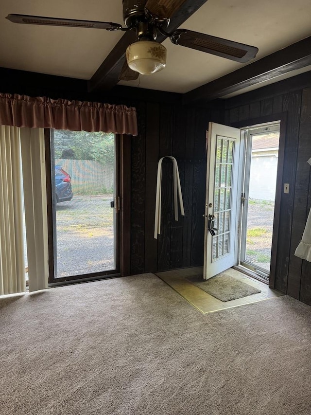 6006 Pershing Ave, Downers Grove, IL 60516 - carpeted entrance foyer with beam ceiling, a ceiling fan, healthy amount of natural light, and wooden walls