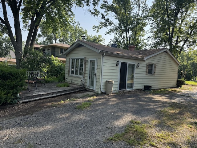 6006 Pershing Ave, Downers Grove, IL 60516 - rear view of property with a deck and a chimney