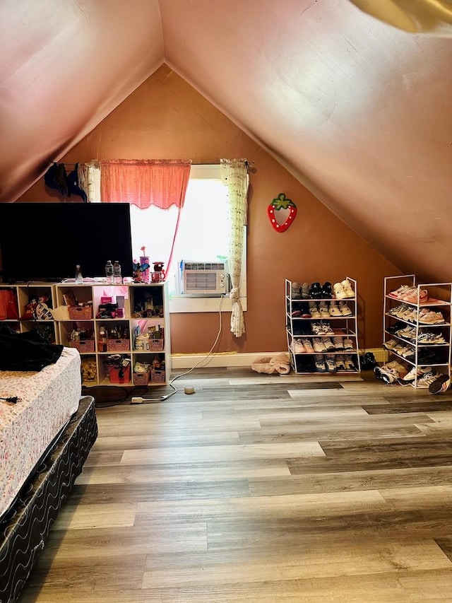 5424 S Winchester Ave, Chicago, IL 60609 - bedroom featuring cooling unit, wood finished floors, and lofted ceiling