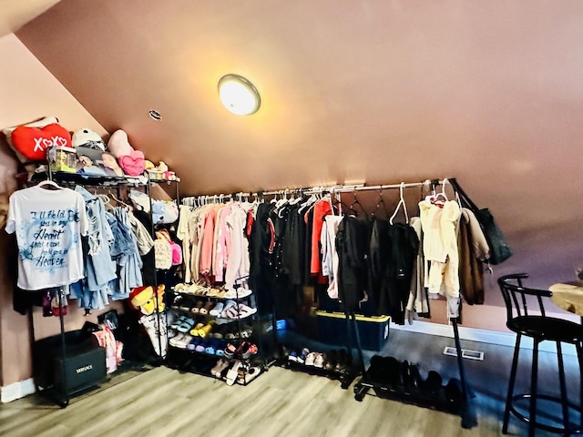5424 S Winchester Ave, Chicago, IL 60609 - walk in closet featuring wood finished floors and lofted ceiling