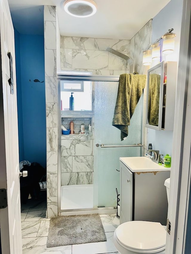5424 S Winchester Ave, Chicago, IL 60609 - full bath with marble look tiles, a shower stall, and vanity