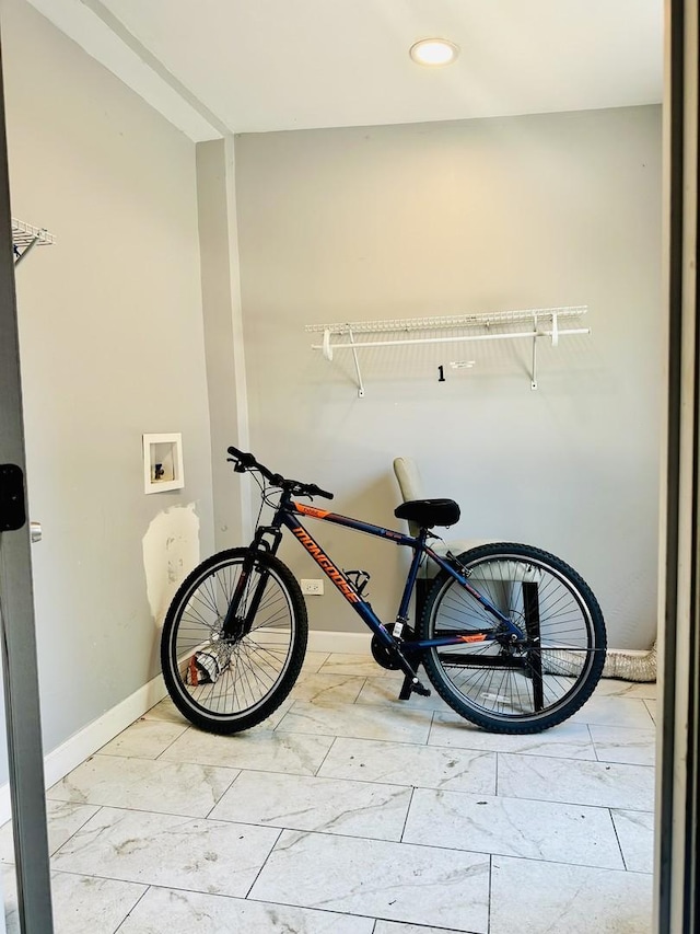 5424 S Winchester Ave, Chicago, IL 60609 - washroom featuring washer hookup, marble look tiles, and recessed lighting