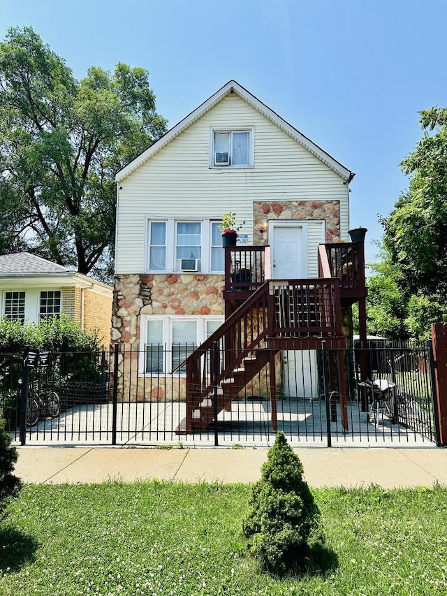 5424 S Winchester Ave, Chicago, IL 60609 - rear view of house featuring stone siding, a patio, and stairs