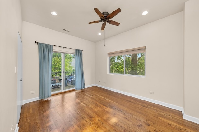 2031 W Saint Paul Ave Unit 2W, Chicago, IL 60647 - empty room with plenty of natural light, wood finished floors, a ceiling fan, and recessed lighting