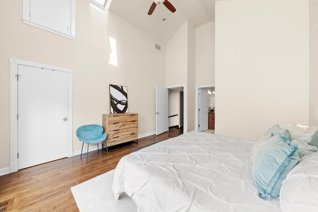 2031 W Saint Paul Ave Unit 2W, Chicago, IL 60647 - bedroom with high vaulted ceiling, light wood-style floors, and ceiling fan