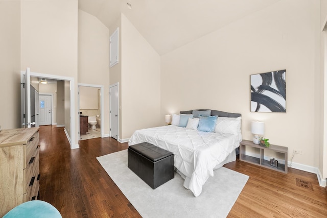 2031 W Saint Paul Ave Unit 2W, Chicago, IL 60647 - bedroom featuring high vaulted ceiling, dark wood-style flooring, and ensuite bathroom