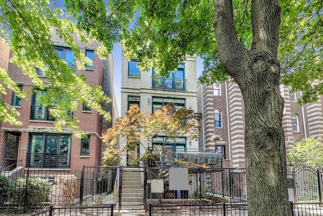 2145 W Crystal St Unit 1, Chicago, IL 60622 - view of front of property featuring a gate and brick siding