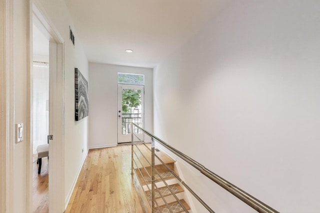2145 W Crystal St Unit 1, Chicago, IL 60622 - hallway with light wood-style flooring, an upstairs landing, and recessed lighting