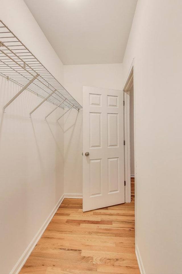 2145 W Crystal St Unit 1, Chicago, IL 60622 - walk in closet with light wood finished floors