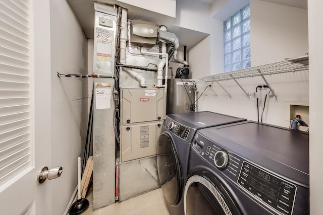 2145 W Crystal St Unit 1, Chicago, IL 60622 - washroom featuring washing machine and dryer and heating unit