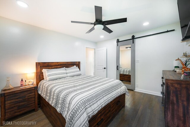 531 Rockland Rd, Crystal Lake, IL 60014 - bedroom with a barn door, dark wood-style flooring, recessed lighting, and a ceiling fan