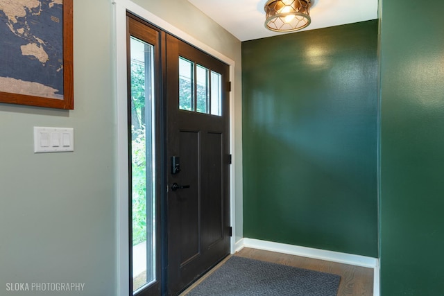 531 Rockland Rd, Crystal Lake, IL 60014 - entryway with wood finished floors and baseboards
