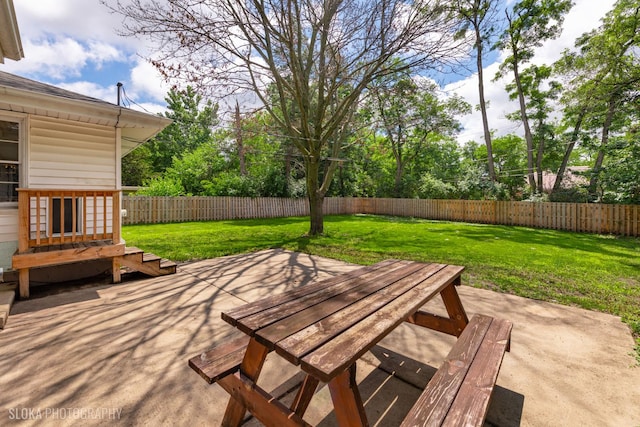 531 Rockland Rd, Crystal Lake, IL 60014 - fenced backyard with a patio and outdoor dining area