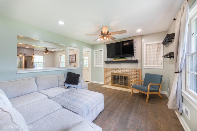 531 Rockland Rd, Crystal Lake, IL 60014 - living room with ceiling fan, dark wood-style flooring, a fireplace, and recessed lighting