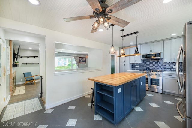531 Rockland Rd, Crystal Lake, IL 60014 - kitchen featuring open shelves, blue cabinets, wood counters, stainless steel appliances, and a ceiling fan