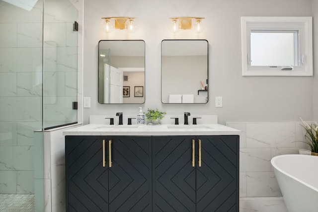 3316 N Leavitt St Unit 2, Chicago, IL 60618 - full bathroom featuring marble finish flooring, a marble finish shower, double vanity, a freestanding tub, and tile walls