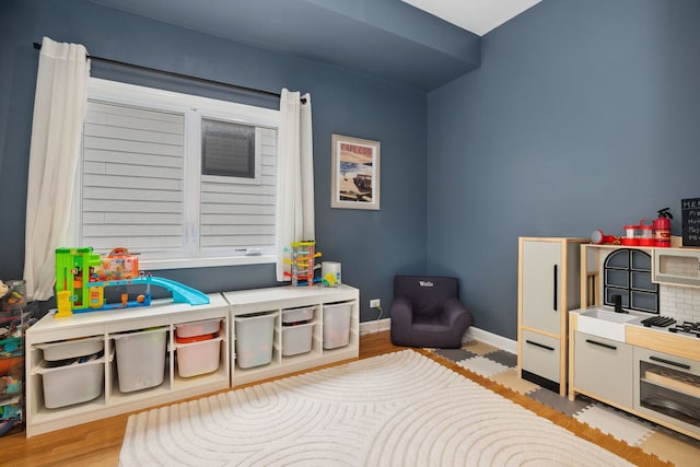 3316 N Leavitt St Unit 2, Chicago, IL 60618 - recreation room with light wood-type flooring and baseboards