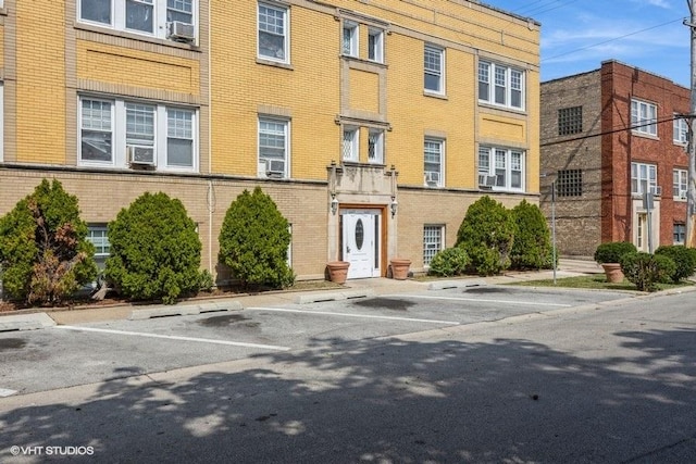 6441 W 18th St Unit 2, Berwyn, IL 60402 - view of building exterior with uncovered parking and cooling unit