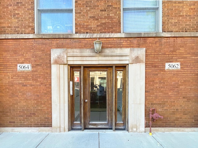5064 W Agatite Ave Unit 3, Chicago, IL 60630 - view of exterior entry with brick siding