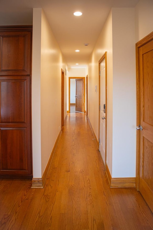 5064 W Agatite Ave Unit 3, Chicago, IL 60630 - corridor featuring light wood-style floors and recessed lighting