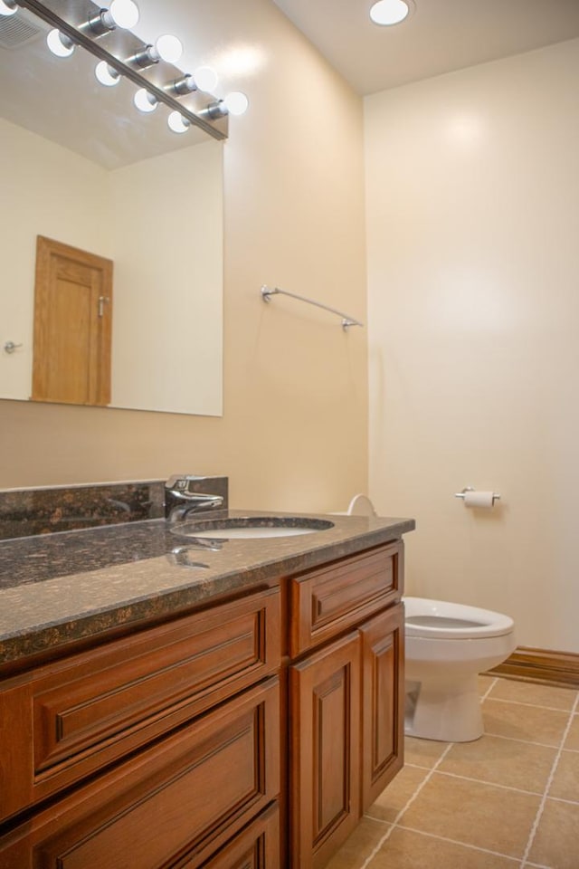5064 W Agatite Ave Unit 3, Chicago, IL 60630 - half bathroom featuring vanity and tile patterned floors