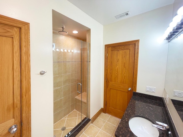 5064 W Agatite Ave Unit 3, Chicago, IL 60630 - full bathroom with a shower stall, vanity, and tile patterned floors