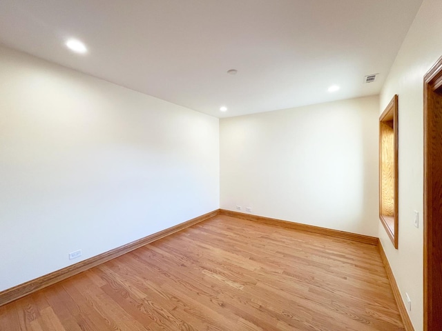 5064 W Agatite Ave Unit 3, Chicago, IL 60630 - unfurnished room featuring light wood-style floors and recessed lighting