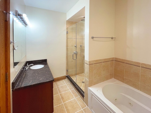 5064 W Agatite Ave Unit 3, Chicago, IL 60630 - full bath featuring a stall shower, a whirlpool tub, vanity, and tile patterned flooring