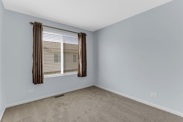 406 Prairie Ct, Morton Grove, IL 60053 - spare room featuring light carpet and baseboards