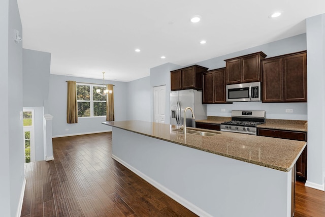 406 Prairie Ct, Morton Grove, IL 60053 - kitchen featuring appliances with stainless steel finishes, dark wood finished floors, dark brown cabinets, a chandelier, and a kitchen island with sink