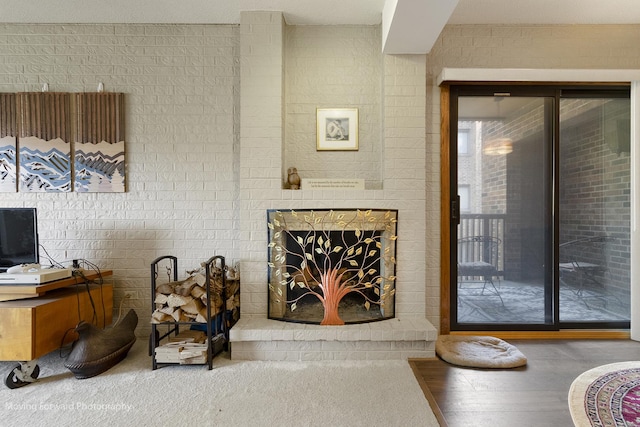 1502 Woodbridge Rd Unit 2H, Joliet, IL 60436 - carpeted living area with a fireplace