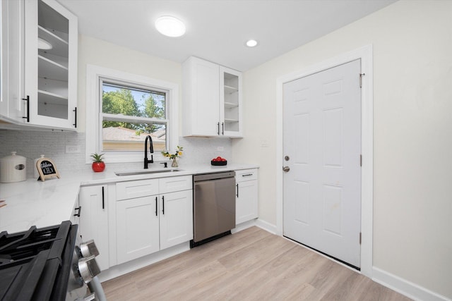 10846 S Sacramento Ave, Chicago, IL 60655 - kitchen featuring stainless steel dishwasher, gas range oven, decorative backsplash, white cabinetry, and recessed lighting