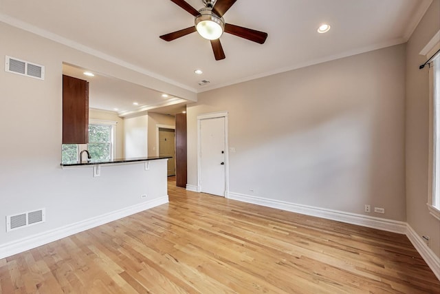3851 N Kedvale Ave Unit E3, Chicago, IL 60641 - spare room with crown molding, a ceiling fan, light wood-style flooring, and recessed lighting
