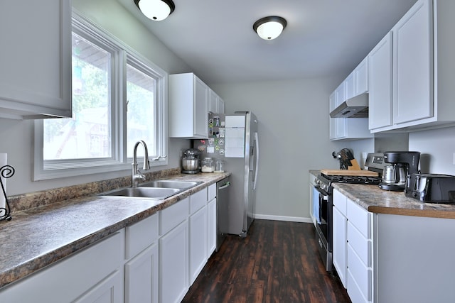 518 Emerson Cir, Bolingbrook, IL 60440 - kitchen featuring appliances with stainless steel finishes, under cabinet range hood, dark wood-type flooring, and white cabinets