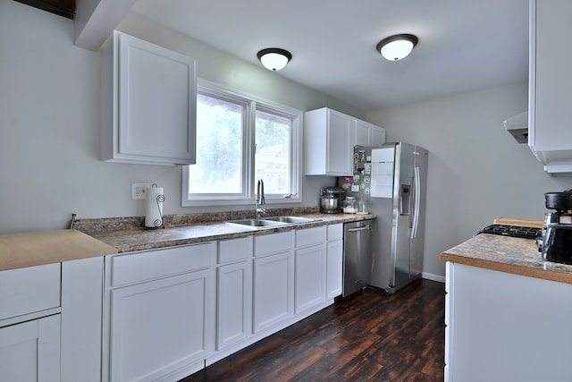 518 Emerson Cir, Bolingbrook, IL 60440 - kitchen with appliances with stainless steel finishes, dark wood finished floors, white cabinets, and exhaust hood
