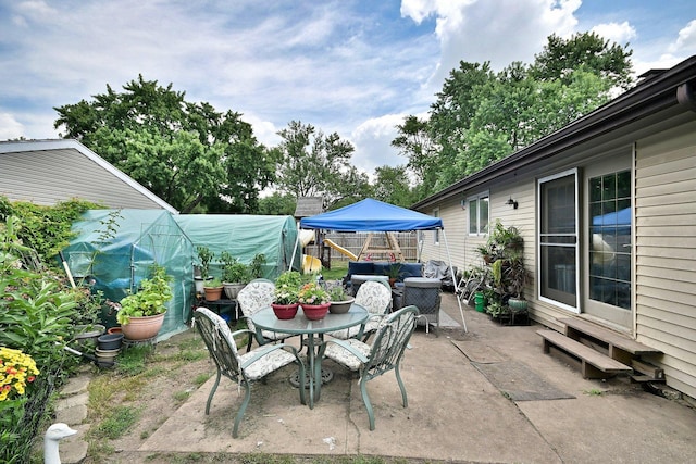 518 Emerson Cir, Bolingbrook, IL 60440 - view of patio / terrace with an exterior structure, entry steps, and an outdoor living space