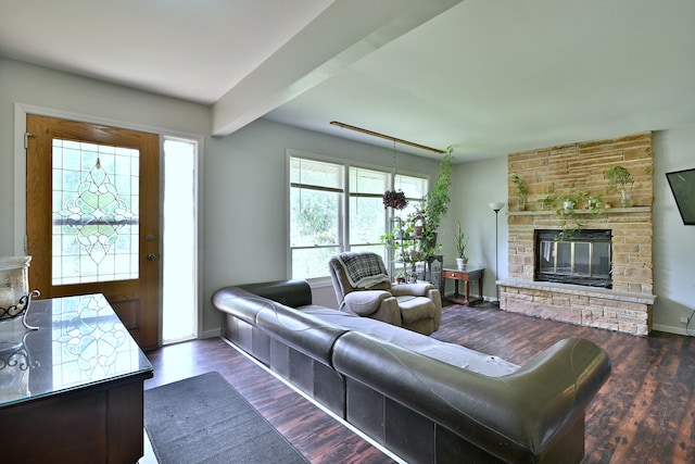518 Emerson Cir, Bolingbrook, IL 60440 - living area with dark wood finished floors, a stone fireplace, and beam ceiling